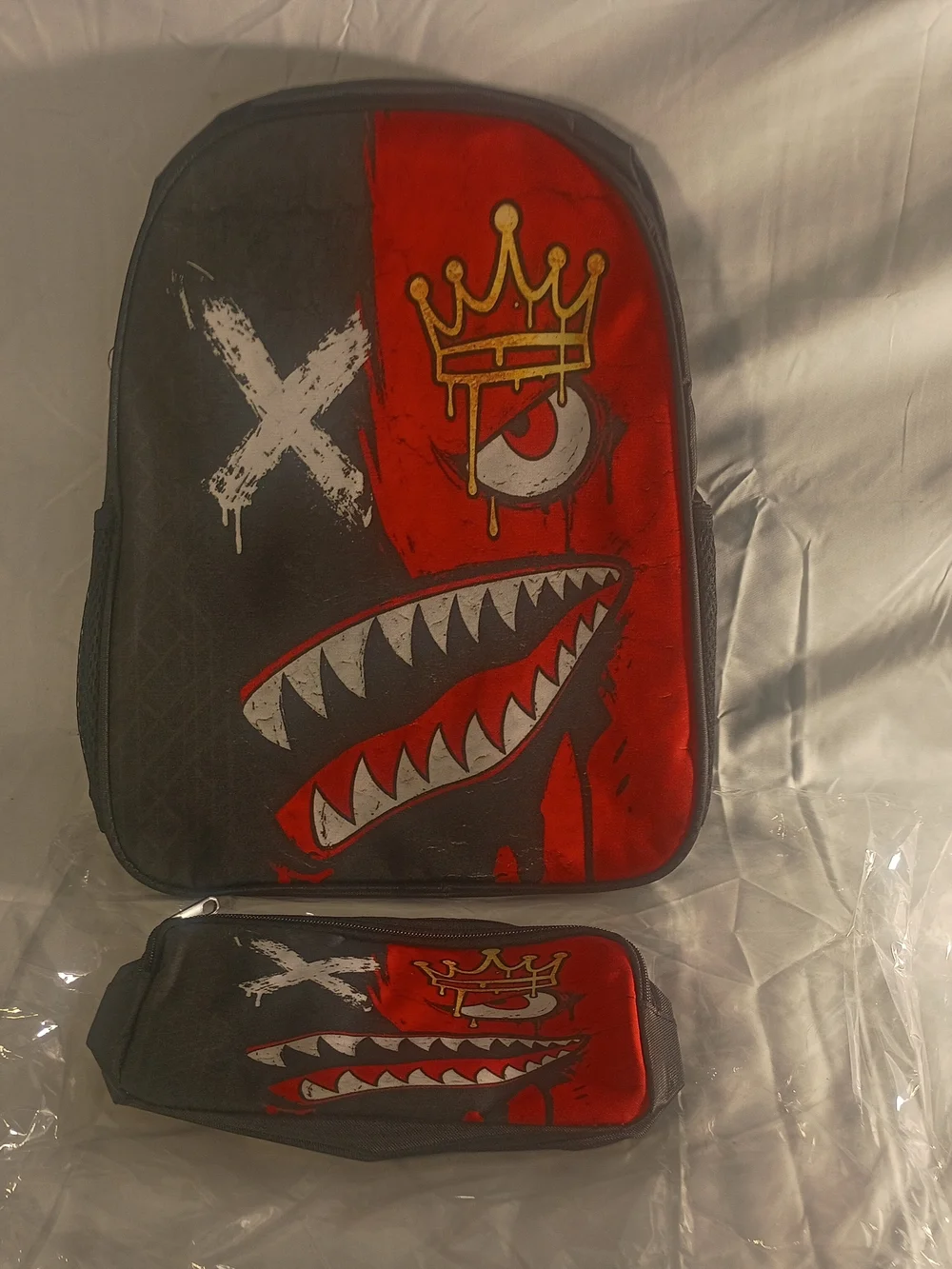 Graphic Shark Face Backpack with Crown and X Design - Black & Red